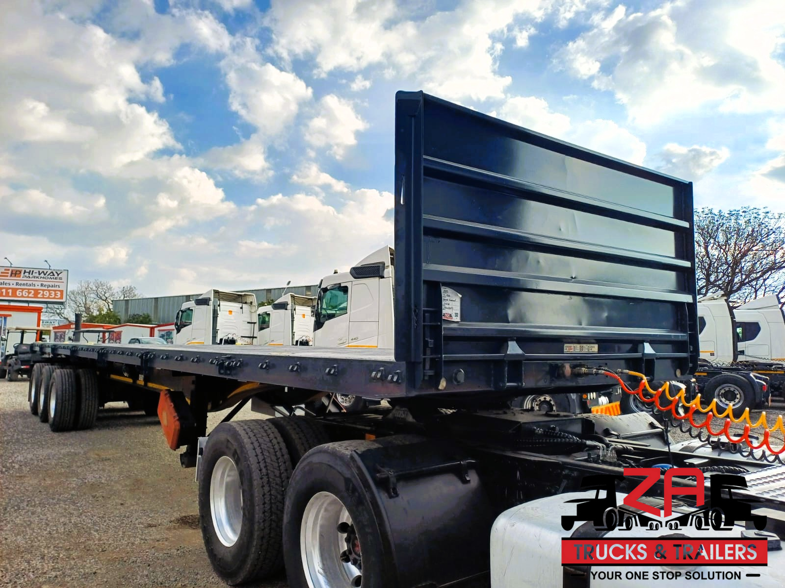 2023 HENRED FRUEHAUF TRI-AXLE FLAT DECK TRAILER #53012